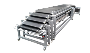 Conveyors for trucks and containers